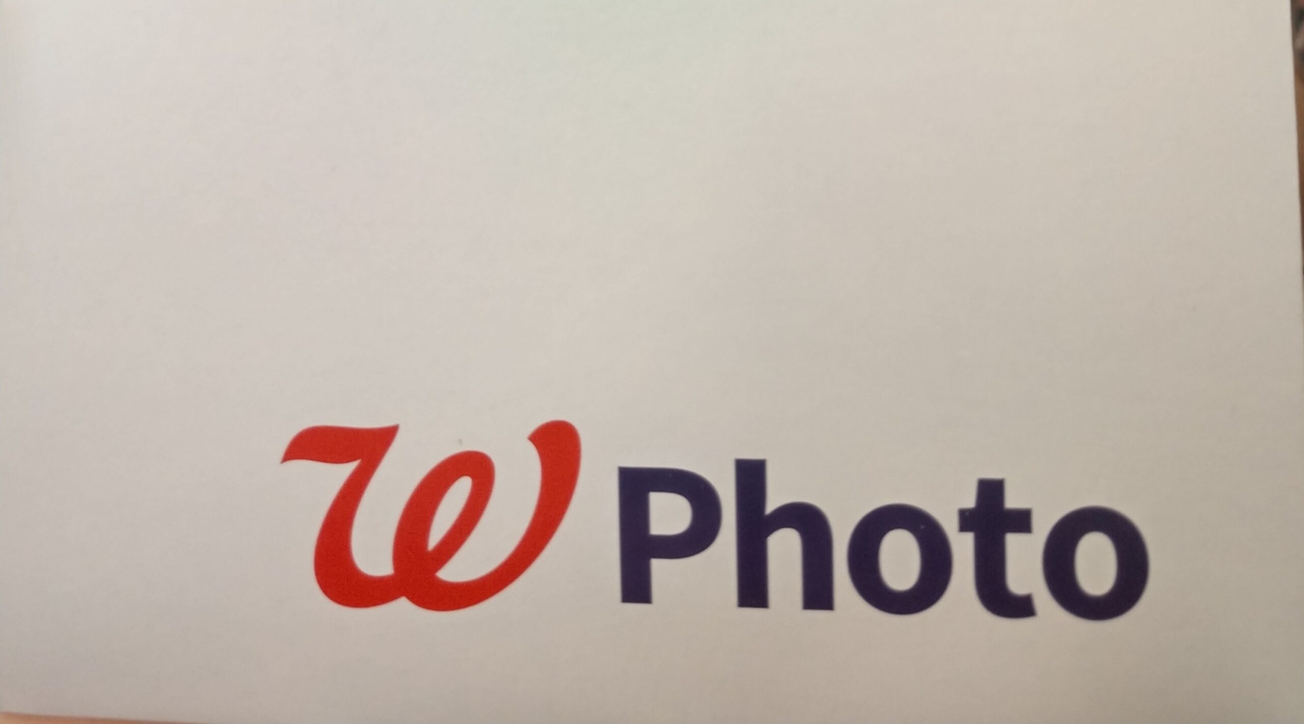A close up of the w logo on a wall
