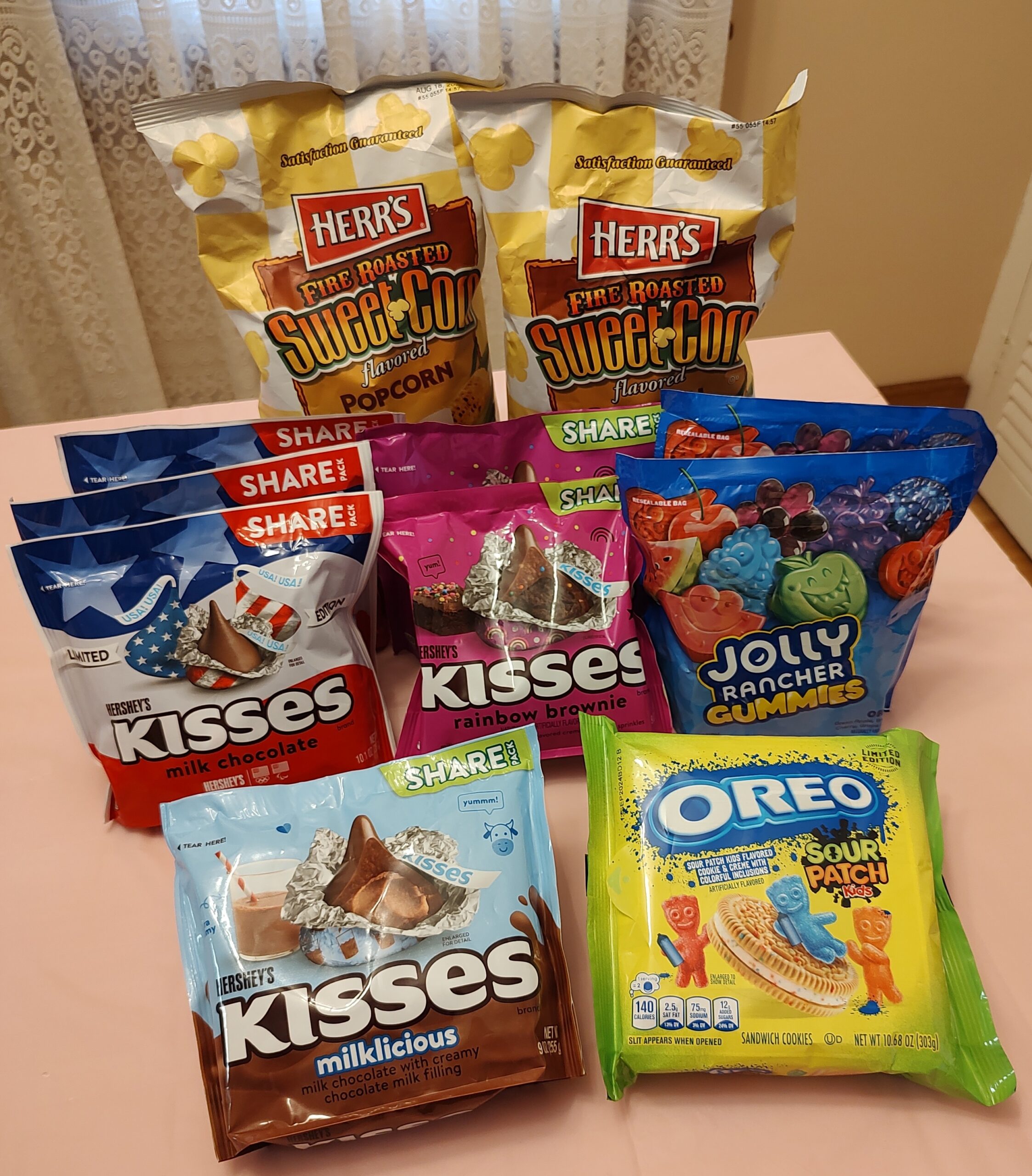 A table with several different types of snacks.
