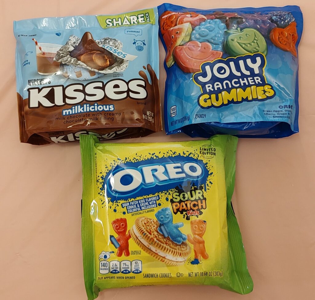 Three different types of candy on a table.